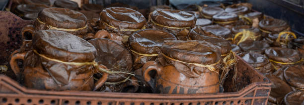 istock Clay pots with hot, covered food. Marrakech, Morocco 1292604418