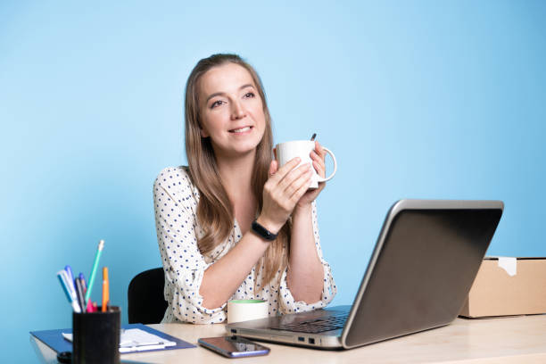 istock Small business, young female entrepreneur working at a Desk, 1292605459