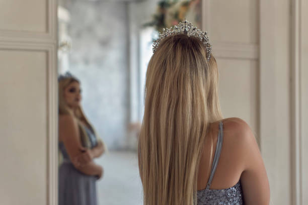 istock Young blonde in a beautiful dress 1292605601