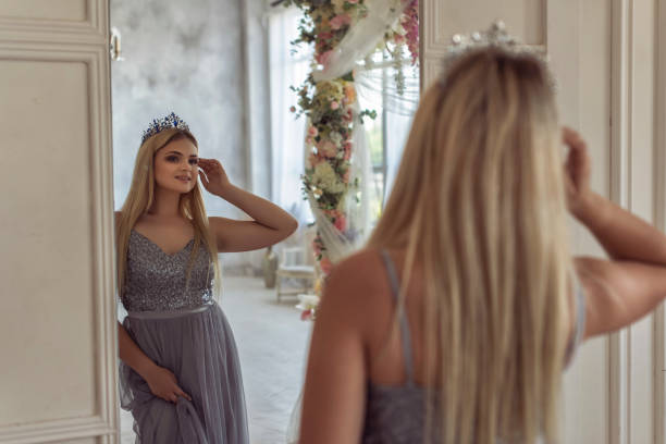 istock Young blonde in a beautiful dress 1292605635