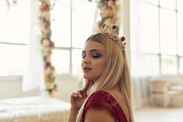 istock Young blonde in a beautiful dress 1292605642