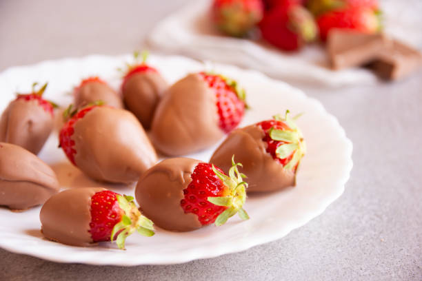 istock Strawberries with chocolate, delicious and gourmet dessert 1292605732