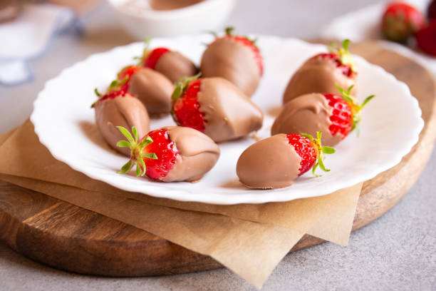 istock Strawberries with chocolate, delicious and gourmet dessert 1292605894