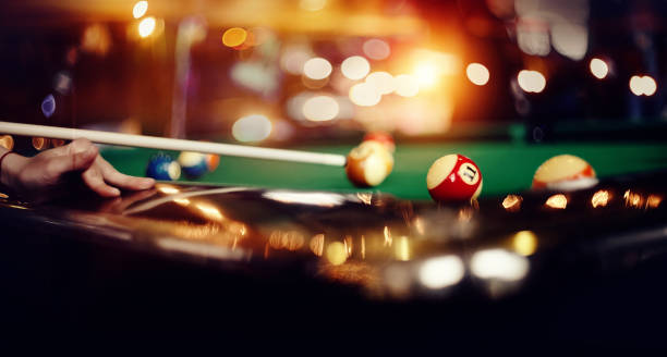 istock Billiard ball with number eleven on a green billiard table. 1292610452