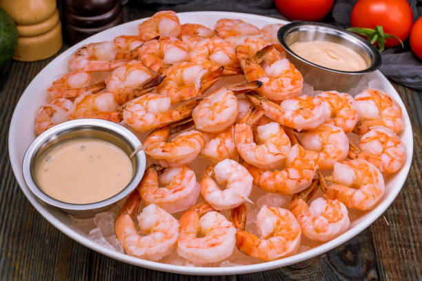 istock boiled shrimp on ice on dark blue table 1292610467