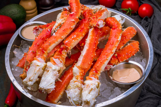 istock King crab claws on wooden table 1292610515