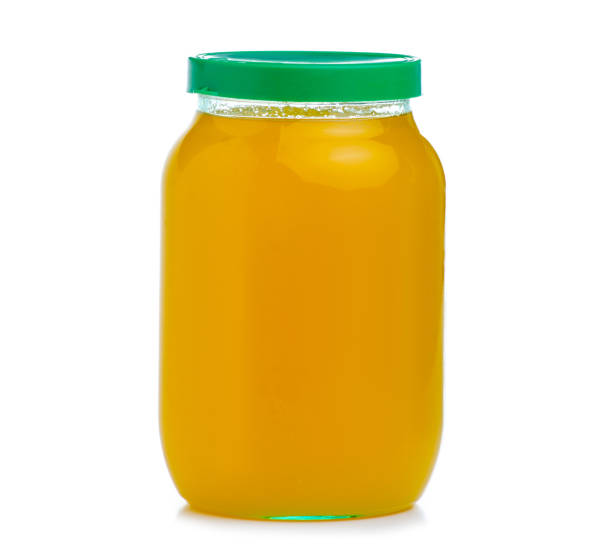 istock Glass jar of honey 1292611889