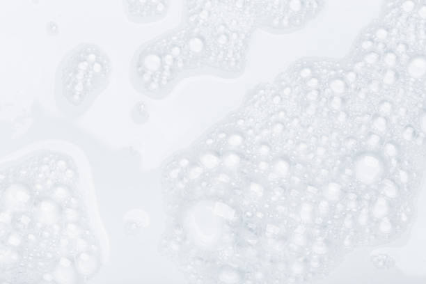 istock Foam bubble from soap or shampoo for washing isolated on white background from above 1292612716