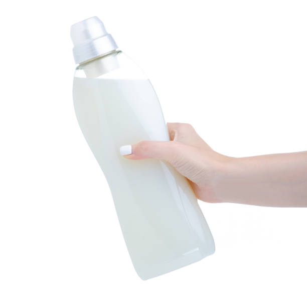 istock White plastic bottle gel liquid conditioner softener in hand 1292612781