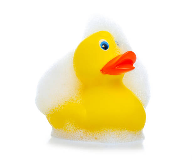 istock Yellow rubber duck with foam 1292612984