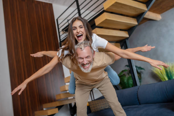 istock Happy couple having fun and feeling happy together 1292613664