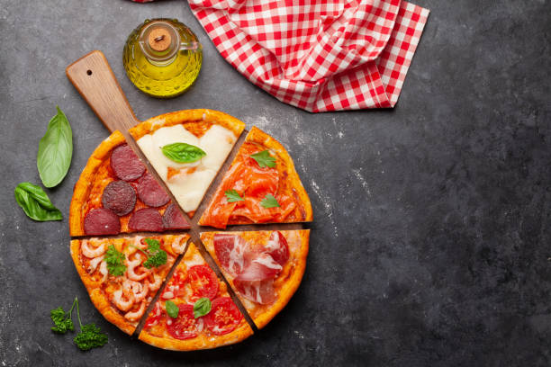 istock Tasty slices of different pizza 1292614952