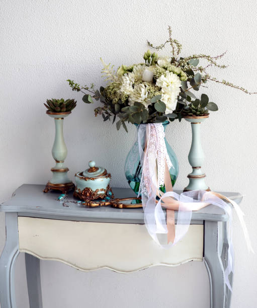 istock A large beautiful wedding bouquet with white ribbons stands on the table 1292615194