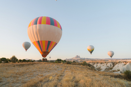 A hot air balloon drifting in the sky.