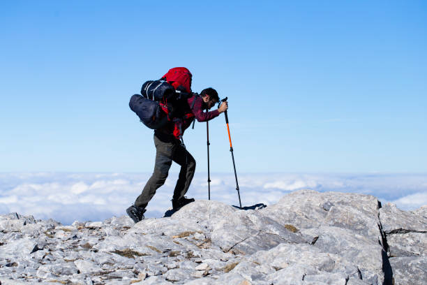 istock mountaineer on the dangerous cliffs 1292622051