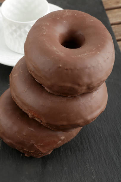 istock chocolate donuts as sweet temptation for breakfast 1292624786