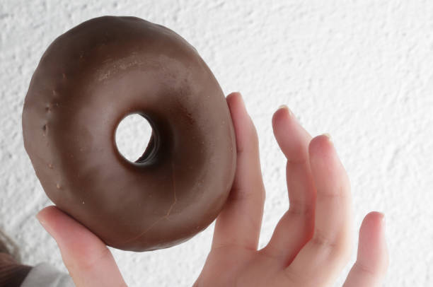 istock chocolate donuts as sweet temptation for breakfast 1292624836