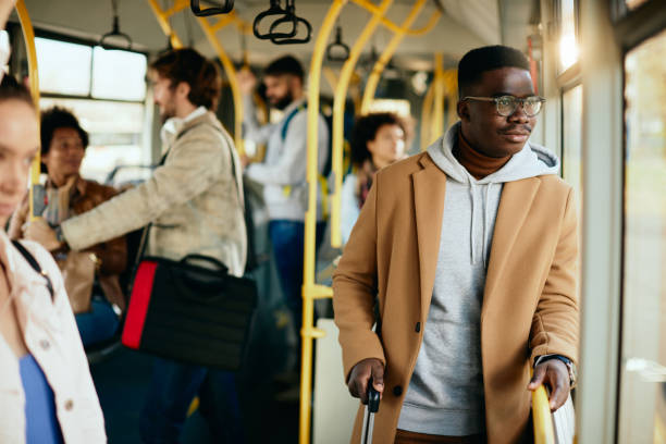 istock Young African American man commuting by public transport. 1292624933
