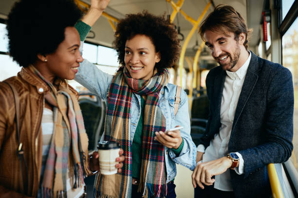 istock Group of happy friends talking while traveling by bus. 1292624969