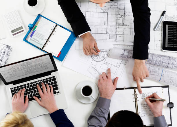 istock Business people at desk 1292626084