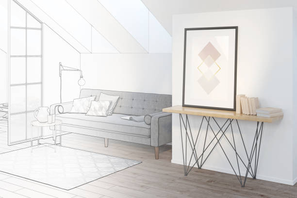 istock The sketch becomes a real attic with a horizontal poster on a wall between a sofa with a coffee table and a glass partition. There are a roof window and a carpet on the floor in the room. 1292627444