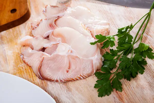 Photo of Raw blue shark fish steaks, seafood ingredients