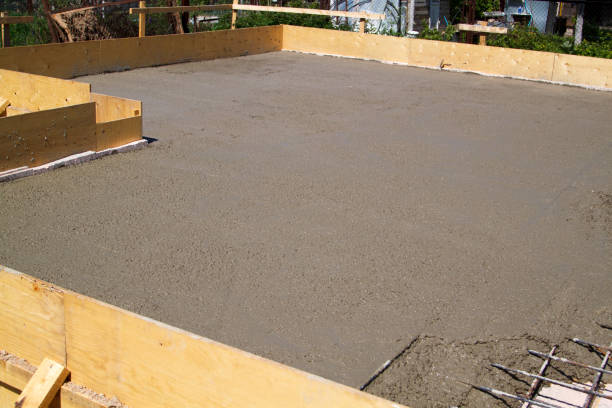 istock concrete slab of foundation with wooden formwork 1292628348