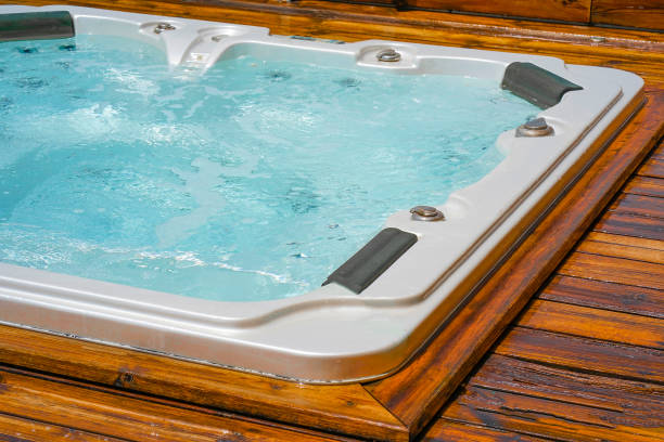 istock Hotel staff worker cleaning hot tub 1292628445