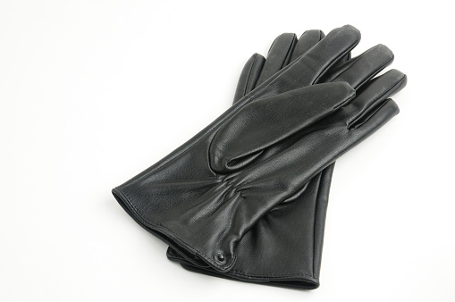 Casual leather gloves on white isolated background