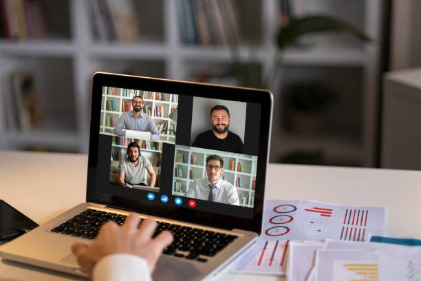 istock Laptop screen view diverse businesspeople involved at group videocall 1292631330
