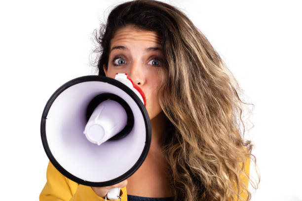 istock Woman screaming on a megaphone. 1292631970