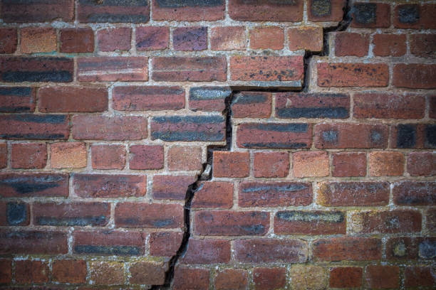 Cracked Red Brick Wall stock photo