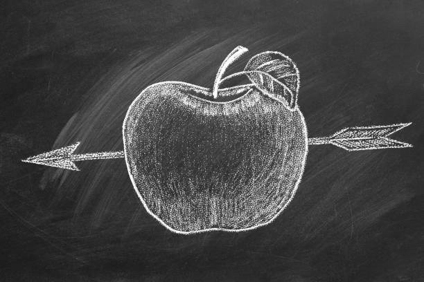 Apple with arrow drawn in chalk. Concept of perfection, success, win, luck, accuracy.