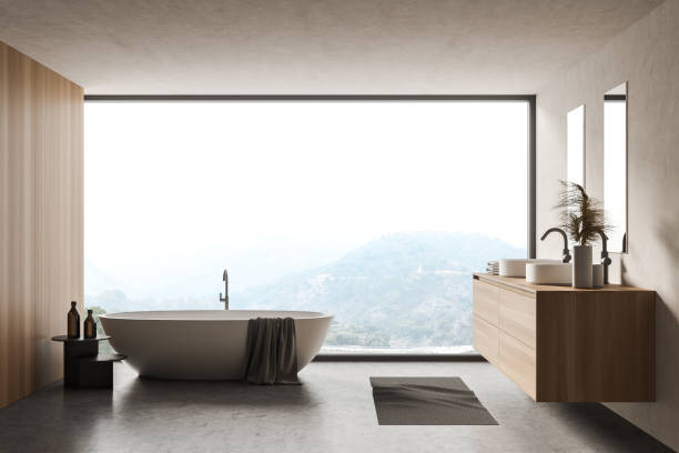 istock Concrete bathroom interior with tub and sink 1292636665