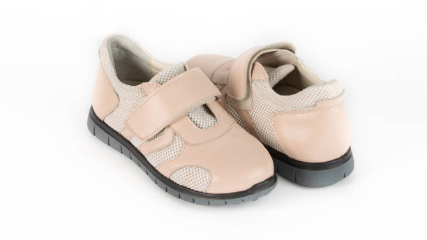 istock children's beige orthopedic shoes on a white background 1292637172