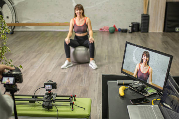 istock Young women doing exercise with ball in front of camera 1292637892