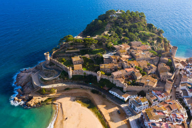 Aerial view of Tossa de Mar, Spain Scenic view from drone of Spanish town of Tossa de Mar, famous tourist destination in Spain tossa de mar stock pictures, royalty-free photos & images