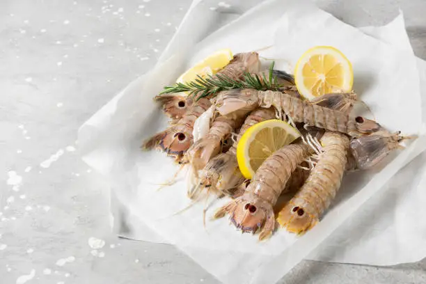 Photo of Fresh seafood mantis shrimps with lemon