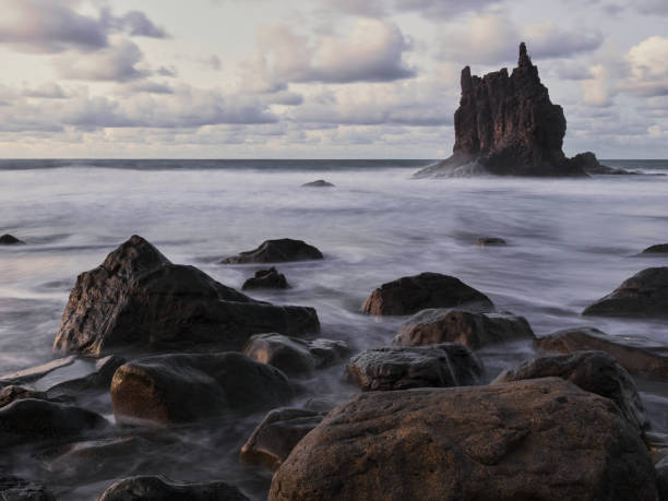 istock Seascape. View on Rock in ocean. 1292645223