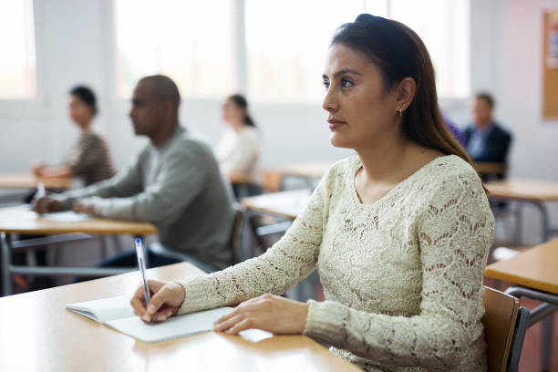 istock Portrait of attentive adult students on training session 1292648049