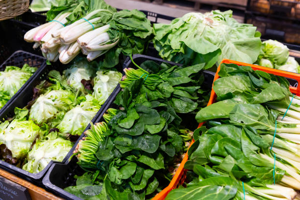 istock Green chard, spinach and lettuce in greengrocery 1292648146
