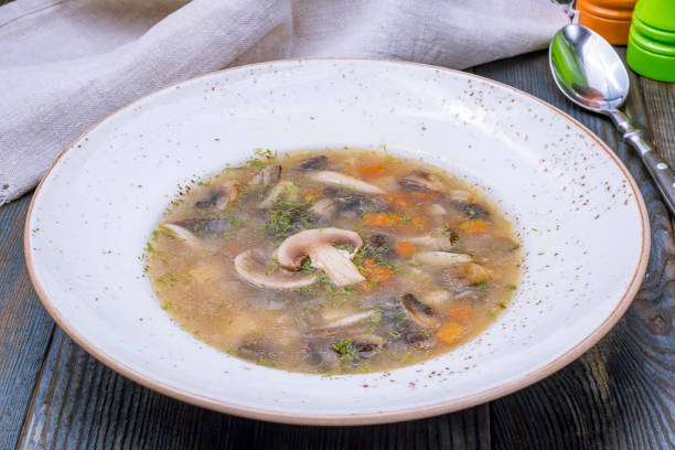 istock soup mushroom in a plate on blue wooden table 1292649874