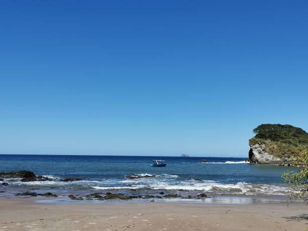 istock view of an island and a boat 1292652024