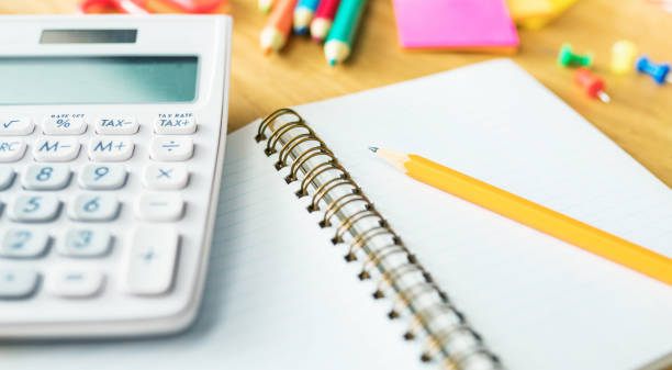 istock Blank notebook and office or school supplies 1292652204