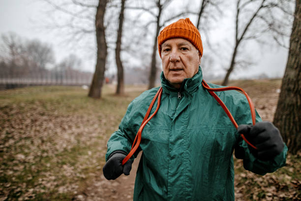 istock Senior man jogging in nature 1292653485