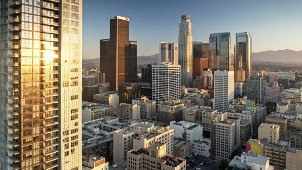 istock Rising Sun Shining on Downtown LA Buildings 1292657545