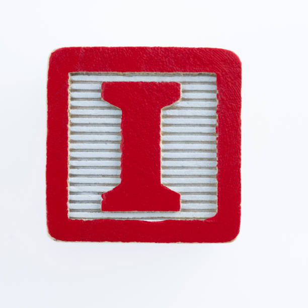 istock Wooden block with letter I on white background 1292658553