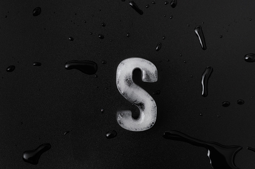 Ice letter S on black background.