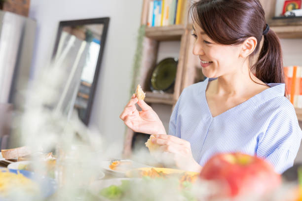 istock asian woman who eats 1292662234