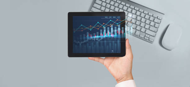 istock Business plan graph growth  increase of chart positive indicators in his business,tablet in hand 1292662247